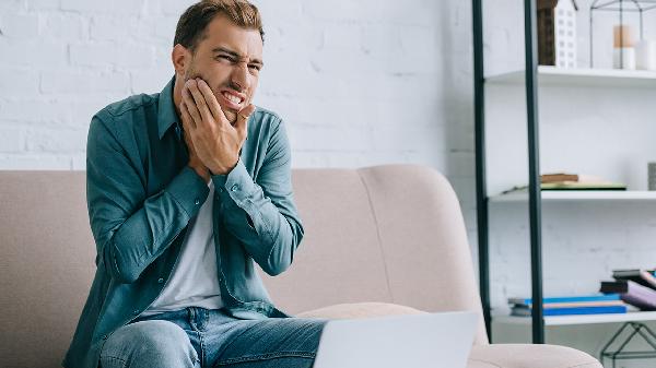 拔了下边的智齿疼又好多口水怎么回事